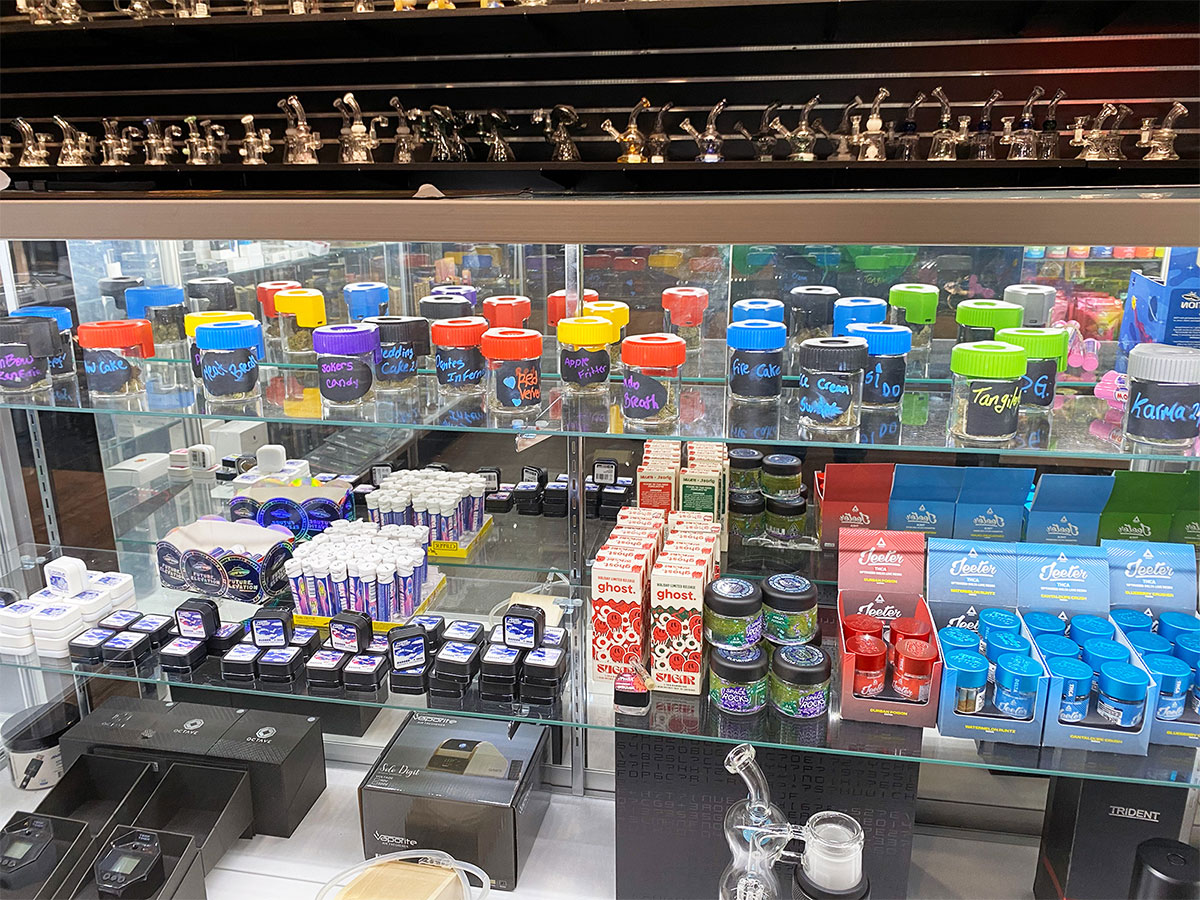 A product display of smoking accessories, THCa flower, concentrates and more at our smoke shop near Riverdale Borough, Butler, New Jersey.