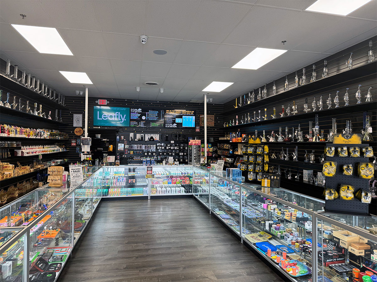 The interior of our smoke shop near Vernon Valley, Vernon, New Jersey, with cases and items on the walls.