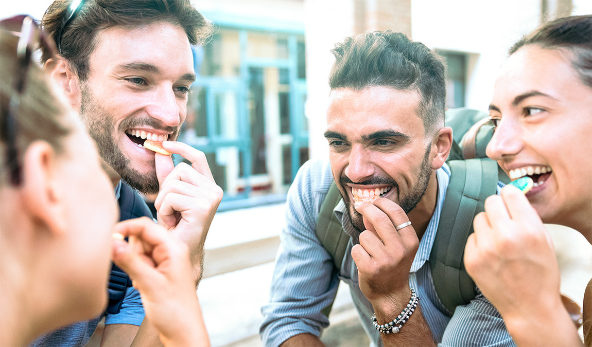 Four people enjoying Buffalo THC gummies bought from Future Elevation.